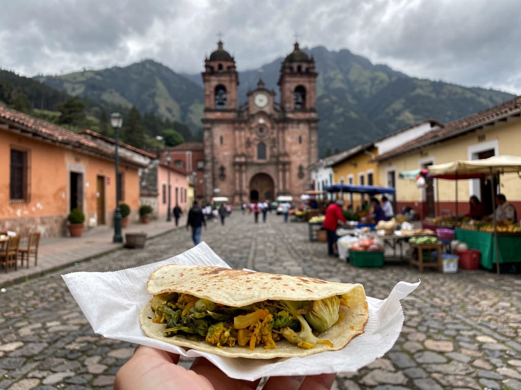 Quesadilla on paper, flor de calabaza visible, mercado stall behind